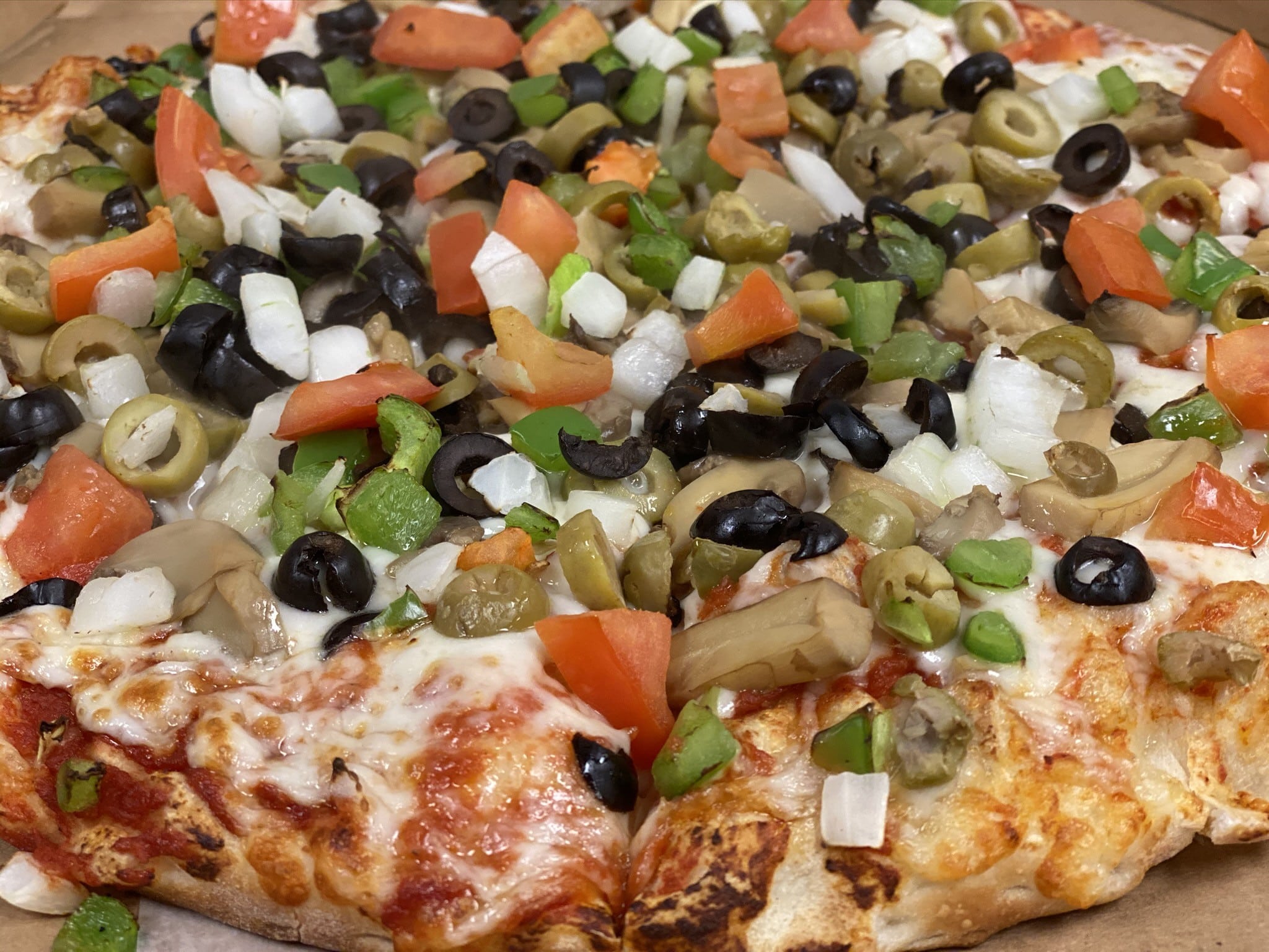 Thin Crust Pizza On A Chopping Board