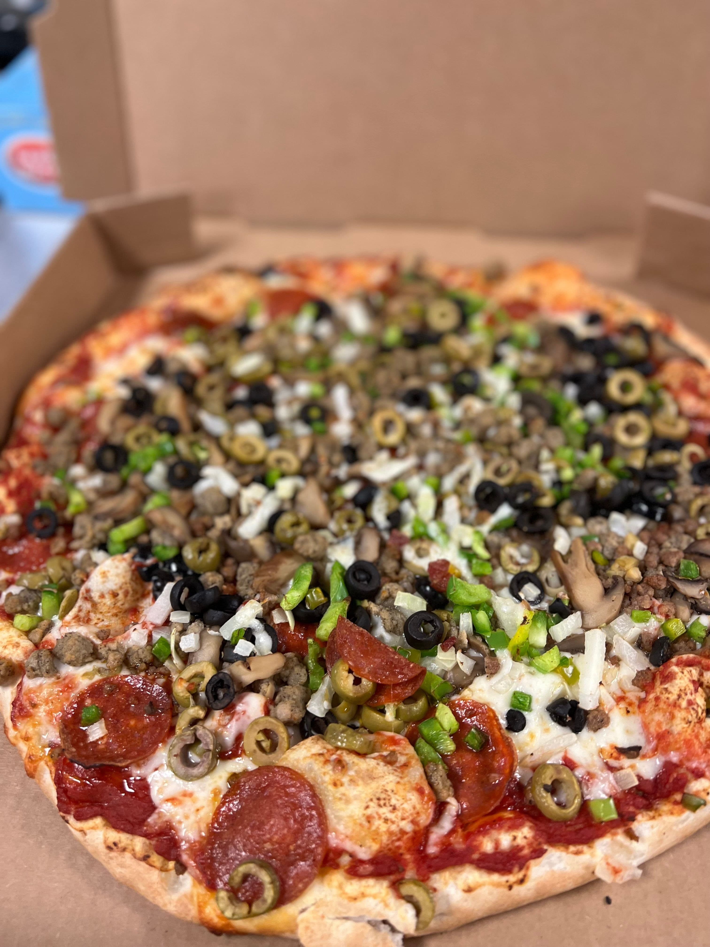Sliced Pizza With A Slicer