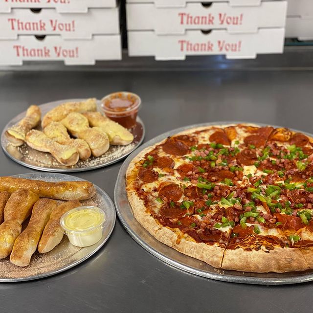 Pizza With Cheese Sticks And Garlic Sticks